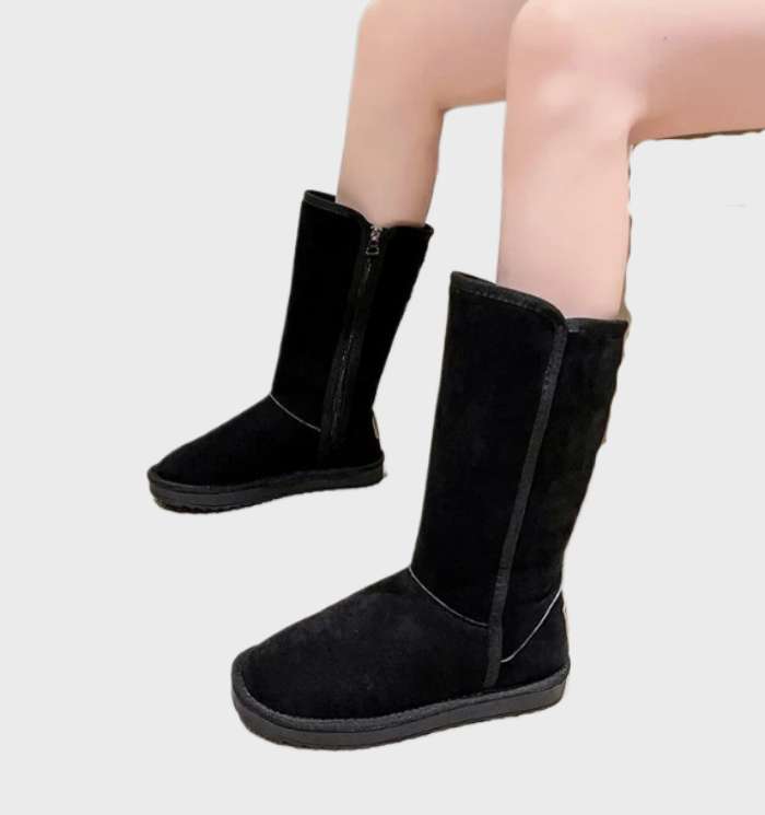De Valeria Waterdichte Suède Sheepskin Laarzen met Ritssluiting bieden luxe warmte en stijlvol comfort, ideaal voor elegante en beschermde winterlooks.