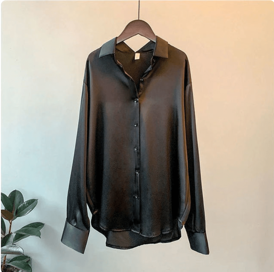 Camicia – Luxe satijnen blouse voor dames, met een vloeiende pasvorm en verfijnde glans voor een elegante look.