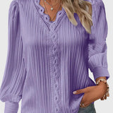 Dames blouse met V-hals en geplooide structuur