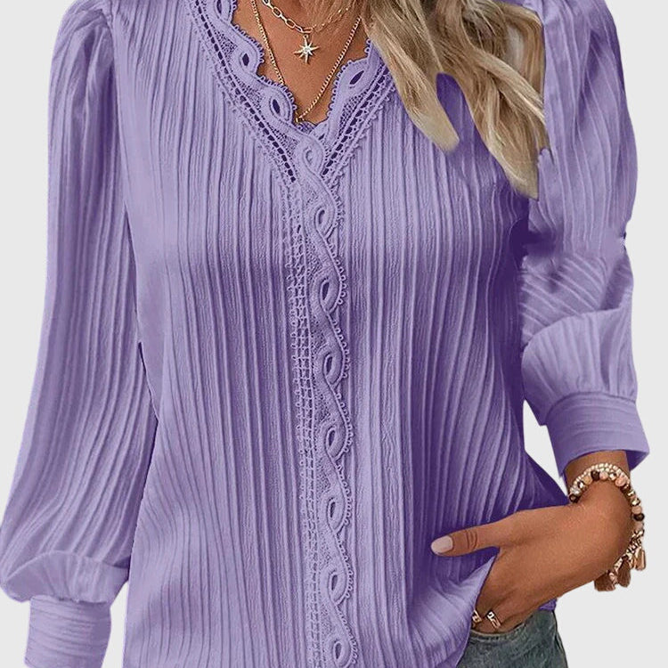 Dames blouse met V-hals en geplooide structuur