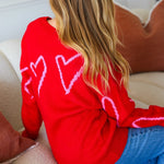 Elena oversized wintertrui voor dames met zachte stof en schattige hartjesprint, perfect voor warme en stijlvolle winterdagen.