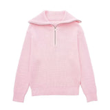 Damestrui met halve rits en wijde kraag, vervaardigd uit een zachte gebreide stof – ideaal voor een casual en comfortabele look.