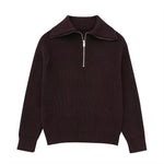 Damestrui met halve rits en wijde kraag, vervaardigd uit een zachte gebreide stof – ideaal voor een casual en comfortabele look.