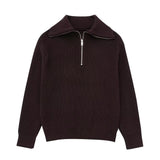 Damestrui met halve rits en wijde kraag, vervaardigd uit een zachte gebreide stof – ideaal voor een casual en comfortabele look.