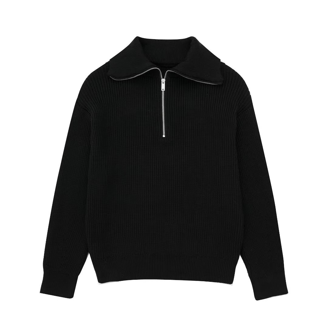 Damestrui met halve rits en wijde kraag, vervaardigd uit een zachte gebreide stof – ideaal voor een casual en comfortabele look.