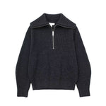 Damestrui met halve rits en wijde kraag, vervaardigd uit een zachte gebreide stof – ideaal voor een casual en comfortabele look.