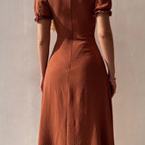 Elegante Midi Jurk met Split en Pofmouwen