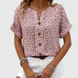 Dames blouse met bloemenprint en knoopdetails