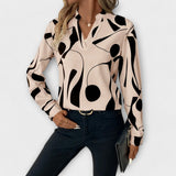 Dames blouse met abstracte print en lange mouwen
