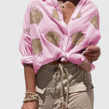 Dames blouse met bladprint en knoopsluiting
