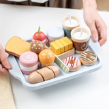 Montessori Picnic Set – interactief ontbijt- en picknickspeelgoed voor kinderen met realistische etenswaren, houten onderdelen en leerzame speelelementen.