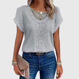 Dames blouse met gehaakt voorpand en korte mouwen