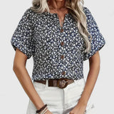 Dames blouse met bloemenprint en knoopdetails