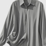 Dames blouse met gedrapeerde hals en lange mouwen
