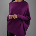 Elegante off-shoulder damestrui in een zachte stof, met lange mouwen en een flatterende pasvorm – ideaal voor een stijlvolle en vrouwelijke look.