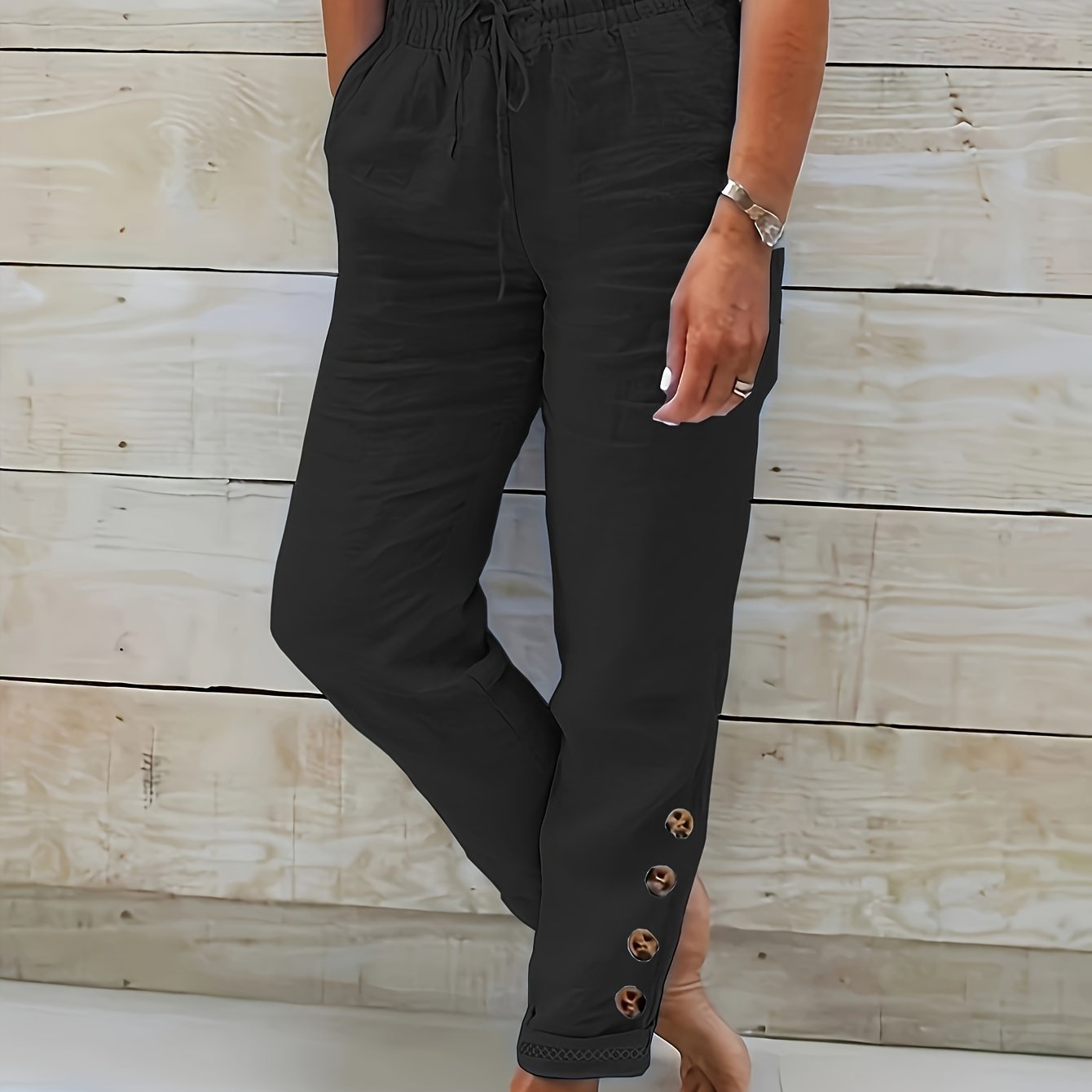 Dames broek met trekkoord en taps toelopende pijpen