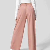 Dames broek met plooien en wijde pijpen
