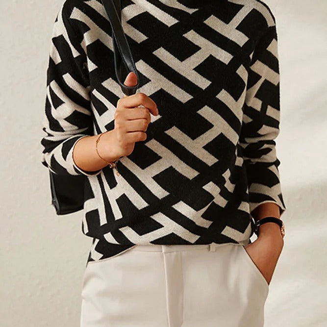 Casual damestrui met geometrisch patroon in zachte kleuren, comfortabele pasvorm en lange mouwen – perfect voor een moderne, alledaagse look.