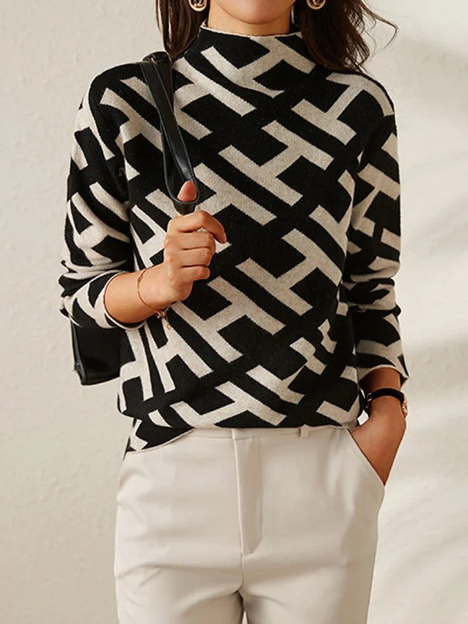 Casual damestrui met geometrisch patroon in zachte kleuren, comfortabele pasvorm en lange mouwen – perfect voor een moderne, alledaagse look.