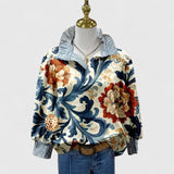 Dames blouse met bloemenprint en gestreepte details