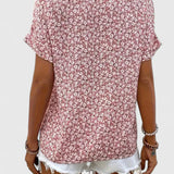 Dames blouse met bloemenprint en knoopdetails