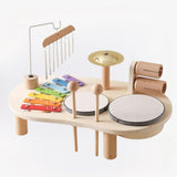 Kinder muziekstation – kleurrijke houten muziekinstrumenten set met xylofoon, trommels en bel, stimuleert ritme, creativiteit en motorische vaardigheden bij kinderen.