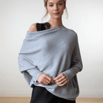 Elegante off-shoulder damestrui in een zachte stof, met lange mouwen en een flatterende pasvorm – ideaal voor een stijlvolle en vrouwelijke look.