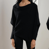 Elegante off-shoulder damestrui in een zachte stof, met lange mouwen en een flatterende pasvorm – ideaal voor een stijlvolle en vrouwelijke look.