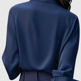 Dames blouse met gedrapeerde hals en lange mouwen