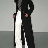 Chaveli lange trenchcoat jas voor dames in elegante stijl met ceintuur en klassieke reverskraag.