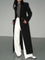 Chaveli lange trenchcoat jas voor dames in elegante stijl met ceintuur en klassieke reverskraag.