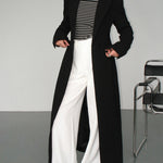 Chaveli lange trenchcoat jas voor dames in elegante stijl met ceintuur en klassieke reverskraag.