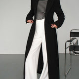 Chaveli lange trenchcoat jas voor dames in elegante stijl met ceintuur en klassieke reverskraag.