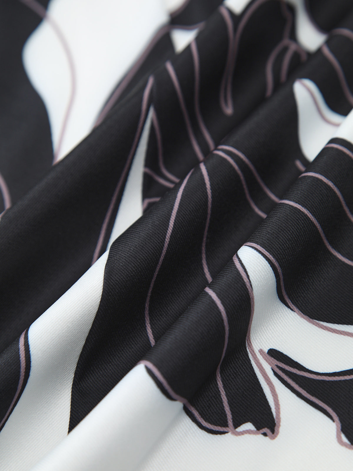 Dunne blazerjas voor dames met een riem en print, een elegante en veelzijdige kledingstuk dat perfect is voor een chique, casual look.