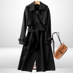 Lange dames trenchcoat in diverse kleuren – elegante pasvorm, hoogwaardige stof en tijdloze stijlvolle uitstraling.