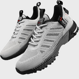 Hektor lichtgewicht zomersportschoenen voor mannen van ademend mesh materiaal met flexibele zool en comfortabele, sportieve pasvorm.
