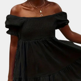 Casual off shoulder zomerjurk voor dames van lichte, ademende stof met relaxte pasvorm en trendy schoudervrij design.