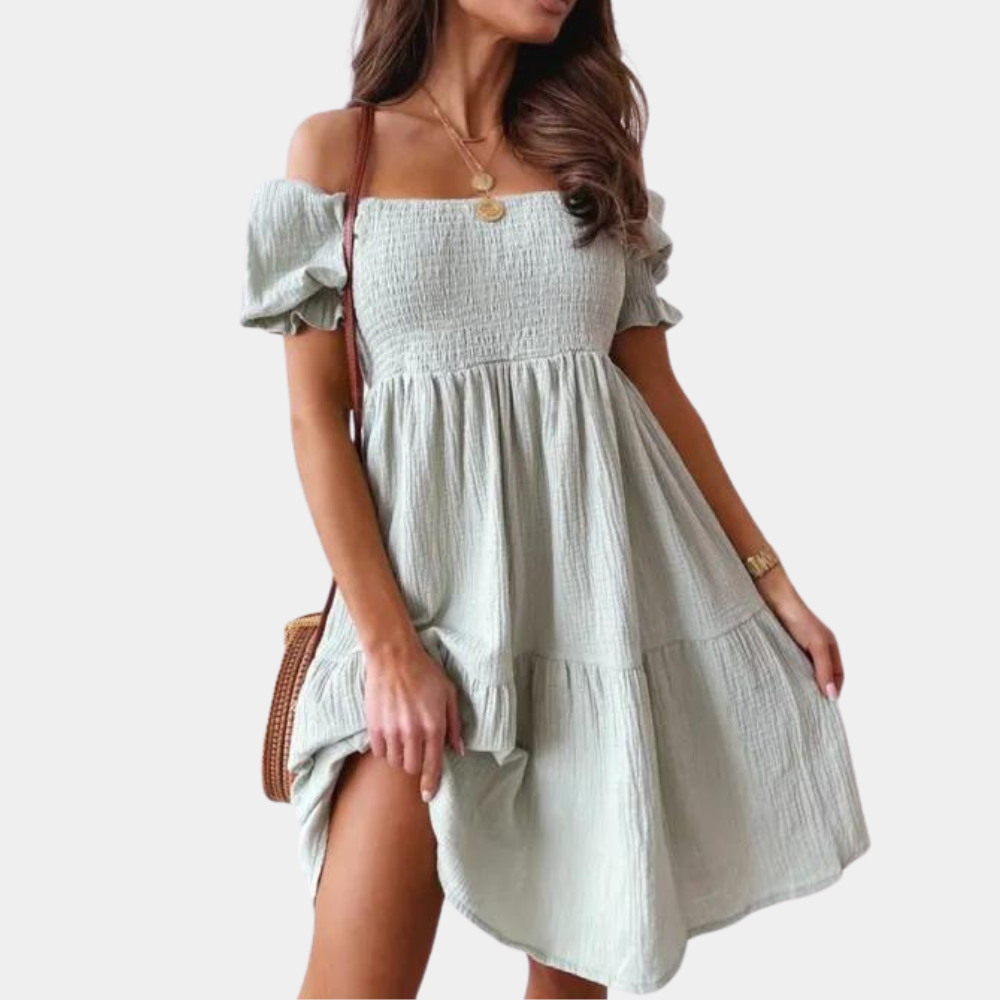 Casual off shoulder zomerjurk voor dames van lichte, ademende stof met relaxte pasvorm en trendy schoudervrij design.