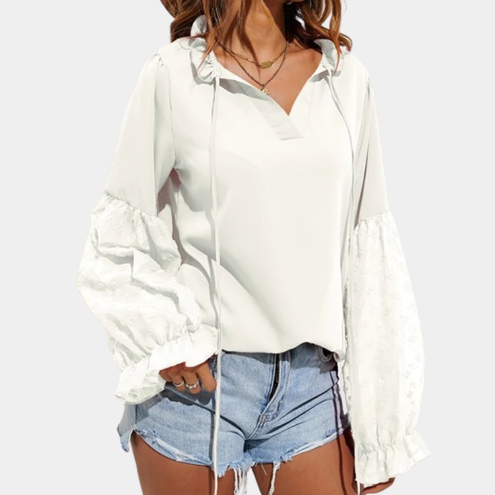 Stijlvolle damesblouse – Elegante blouse met lange mouwen en verfijnde afwerking, perfect voor zowel zakelijke als casual gelegenheden. Comfortabele pasvorm en tijdloos design voor een vrouwelijke uitstraling.