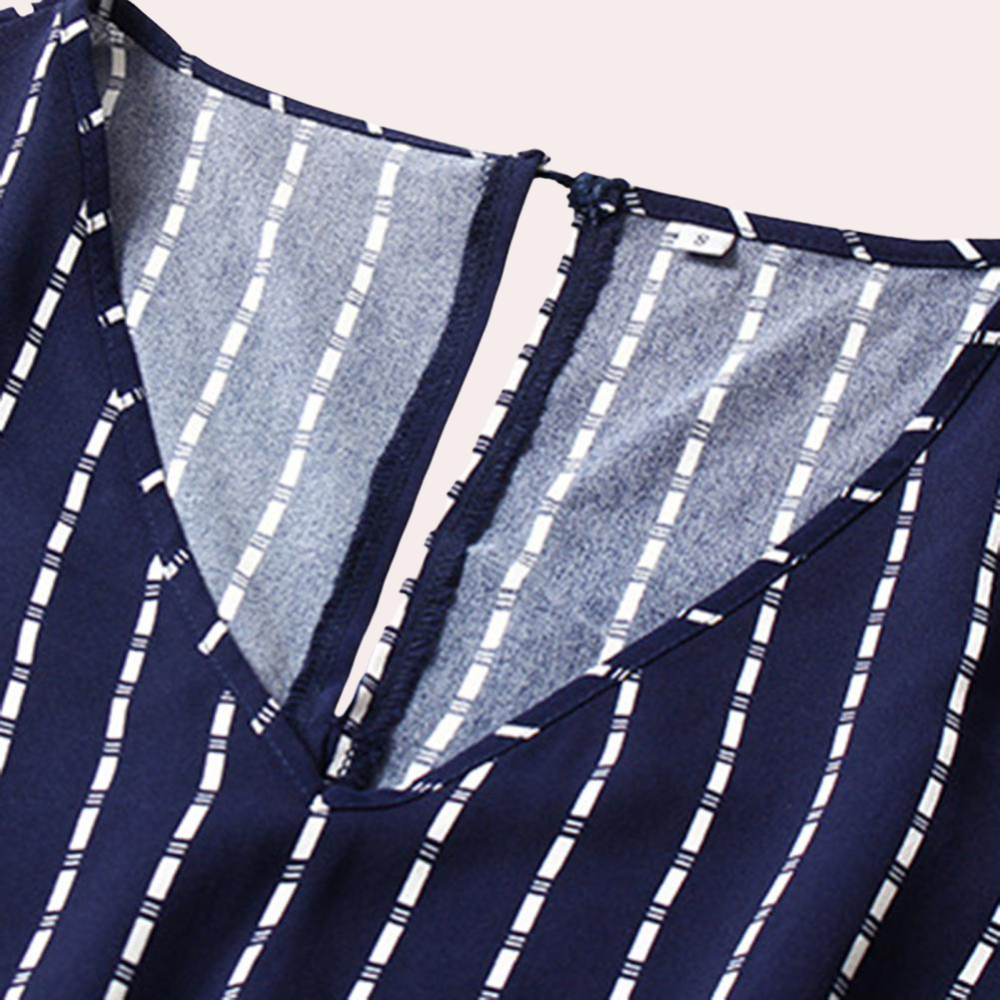 Bohemian zomer midi-jurk voor dames van zachte, luchtige stof met losse pasvorm en speels, etnisch geïnspireerd design.