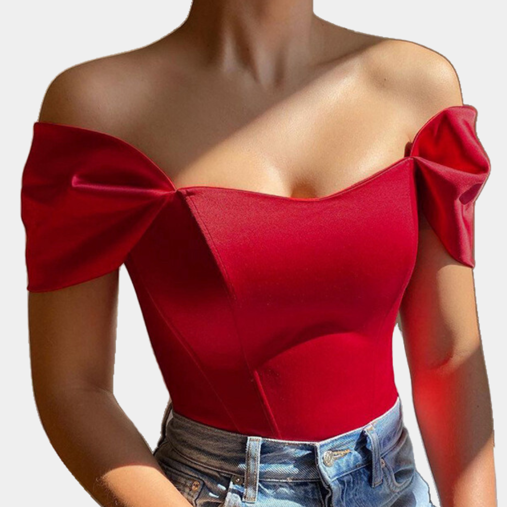 Elegante off‑shoulder zomertop voor dames met luchtige, schoudervrije halslijn en lichtgewicht stof; vrouwelijke, verkoelende must‑have voor stijlvolle zomerlooks.