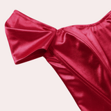 Elegante off‑shoulder zomertop voor dames met luchtige, schoudervrije halslijn en lichtgewicht stof; vrouwelijke, verkoelende must‑have voor stijlvolle zomerlooks.