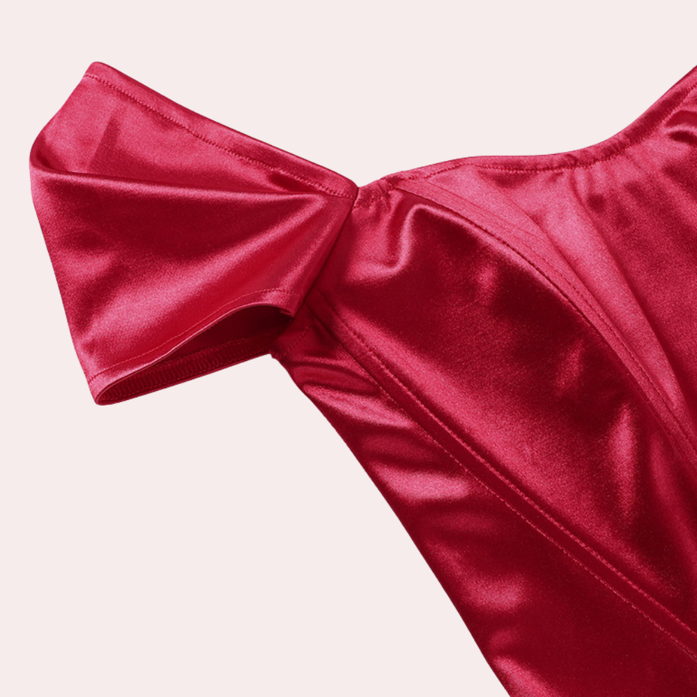 Elegante off‑shoulder zomertop voor dames met luchtige, schoudervrije halslijn en lichtgewicht stof; vrouwelijke, verkoelende must‑have voor stijlvolle zomerlooks.