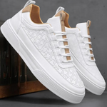 Jiri lichtgewicht en comfortabele zomerse herensneakers van ademend materiaal met flexibele zool en moderne, sportieve uitstraling.
