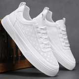 Jiri lichtgewicht en comfortabele zomerse herensneakers van ademend materiaal met flexibele zool en moderne, sportieve uitstraling.
