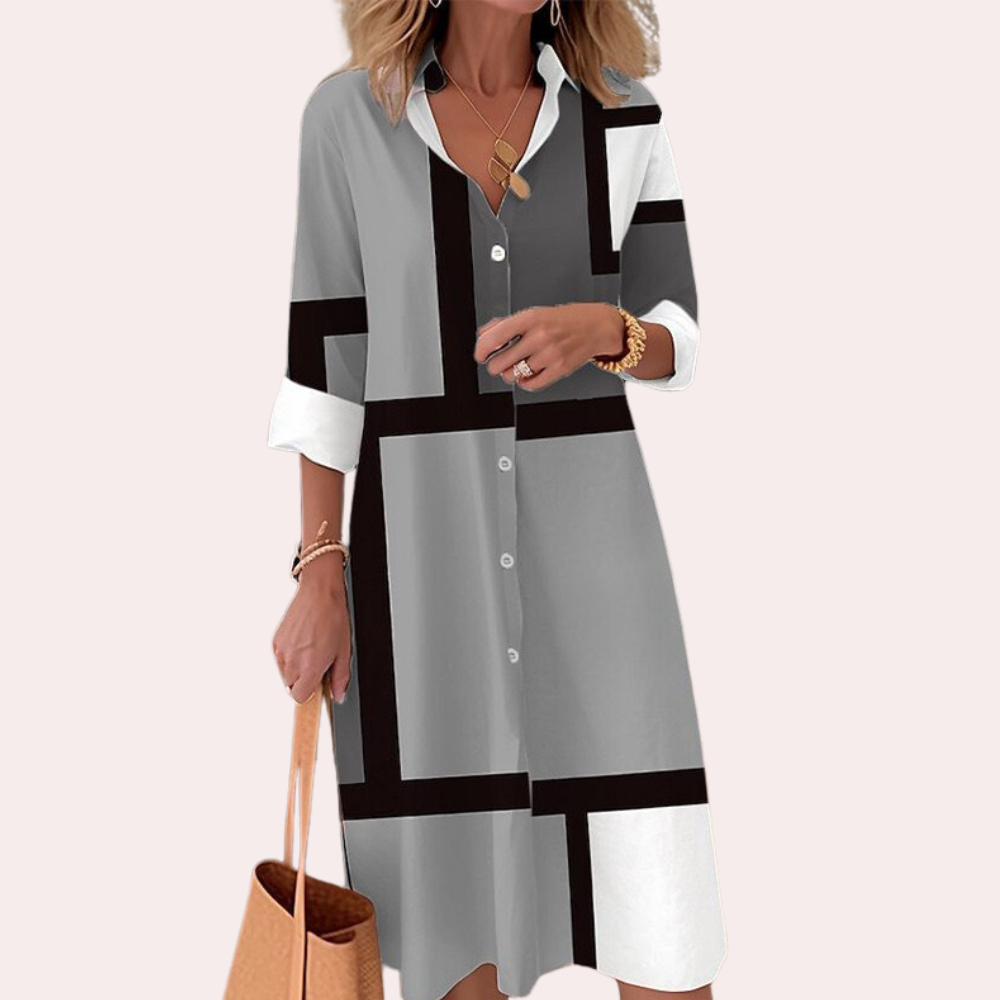 Anna modieuze zomerse midi-jurk van luchtige, ademende stof met flatterende pasvorm en trendy, stijlvol design.