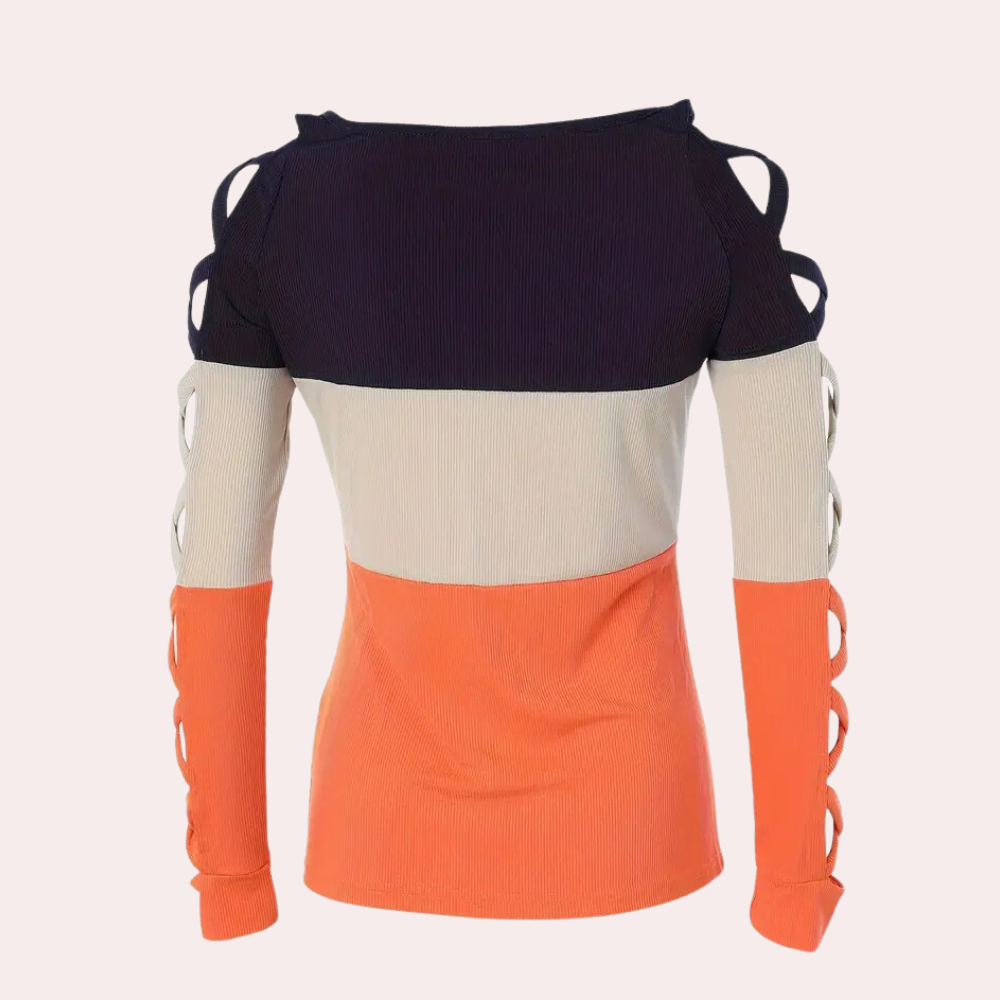 Edina – trendy damesshirt met unieke kriskras mouwen in contrasterende kleuren, modern design met comfortabele pasvorm voor dagelijks gebruik.