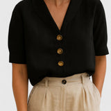Dames blouse met knopen en korte mouwen