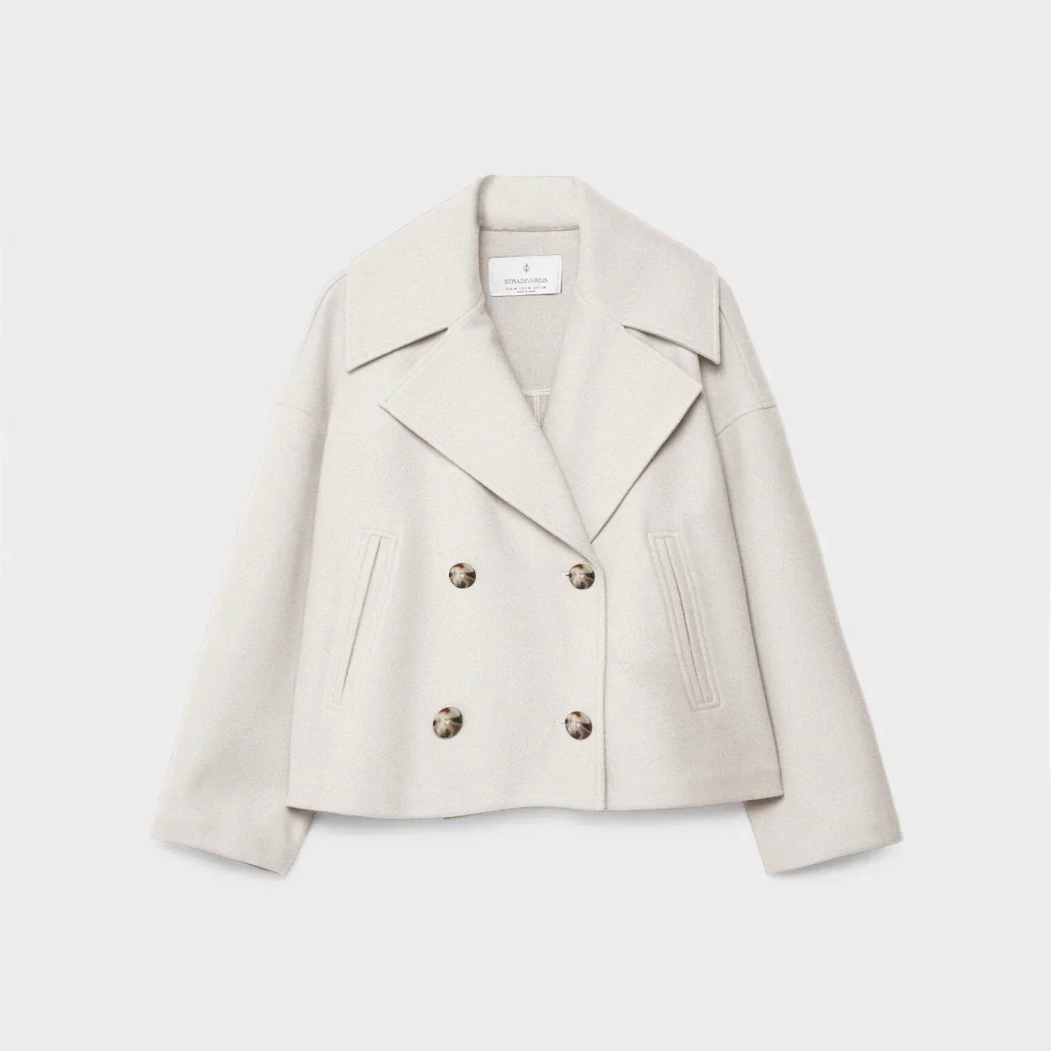 Elara chique korte jas voor dames – stijlvolle jas met dubbele rij knoopsluiting, hoogwaardige stof en comfortabele pasvorm, perfect voor werk of speciale gelegenheden.