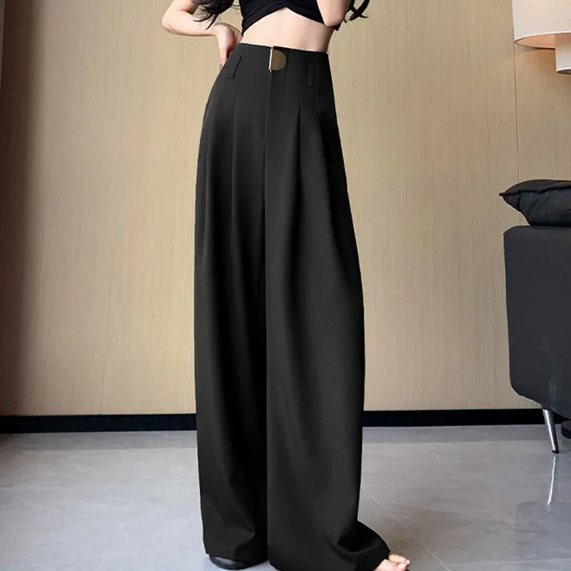 Dressingbroek – hoge taille en wijde pijpen voor een stijlvolle, vlotte look. Perfect voor een elegante en comfortabele outfit, ideaal voor zowel werk als vrije tijd.